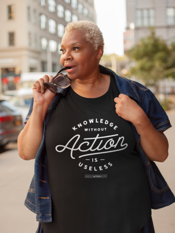 Knowledge without action is useless plus-size-t-shirt-mockup-of-a-woman-with-her-sunglasses-in-her-mouth-